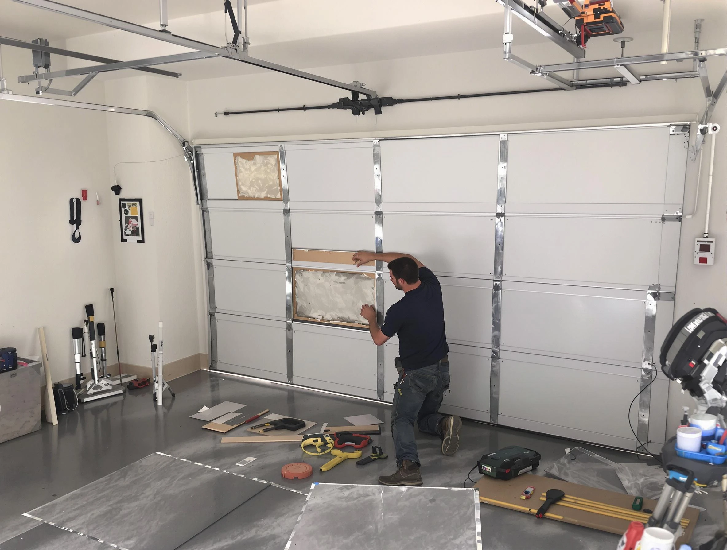 Garage Door Panel Repair in Highland Park